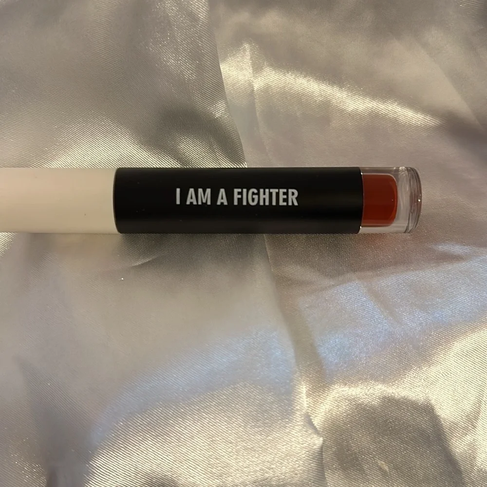 Real Her “ I’m a Fighter “ Colored Lip Gloss